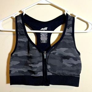 Front zip black and dark gray camouflage sports bra